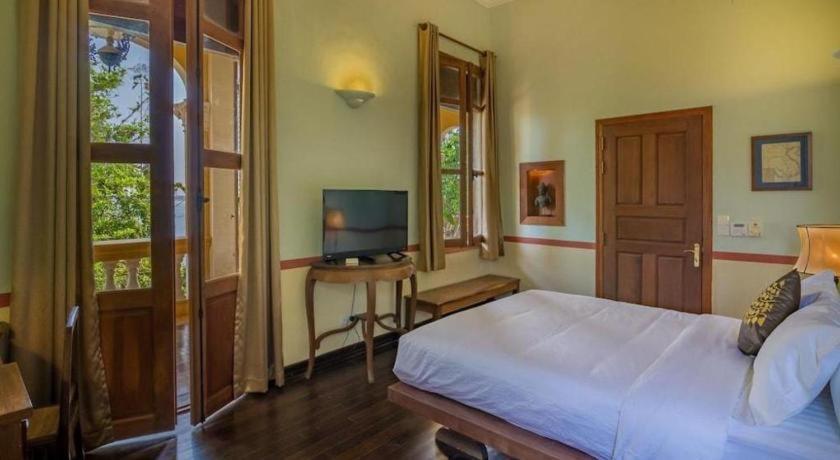 Отель Le Relais De Chhlong Кратьэх Экстерьер фото